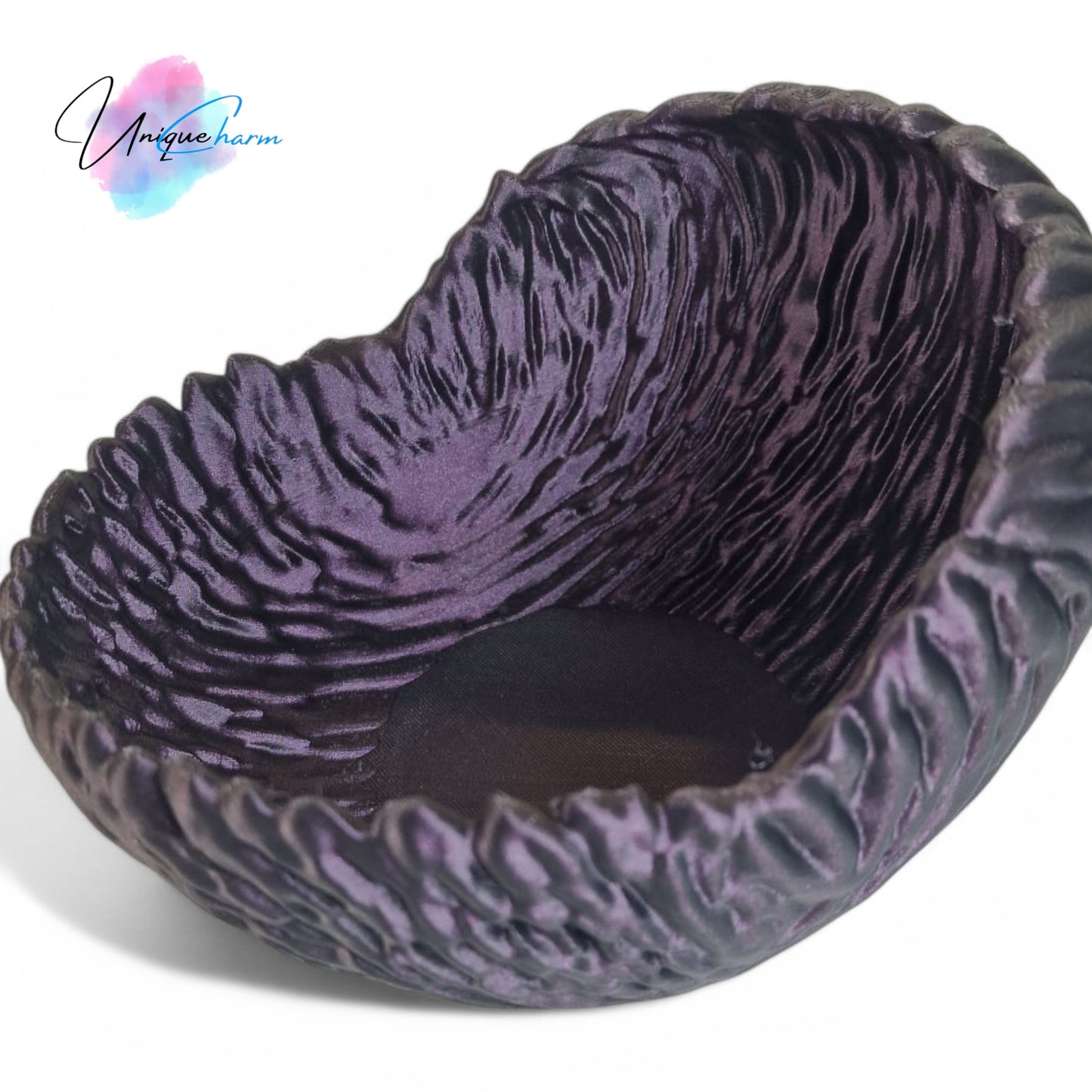 a beautifully designed walnut-shaped bowl resembling a quarter of a walnut shell, perfect as a key tray, candy dish, or nut bowl. features a rustic, nature-inspired design with a smooth finish, making it a stylish and functional home décor piece.