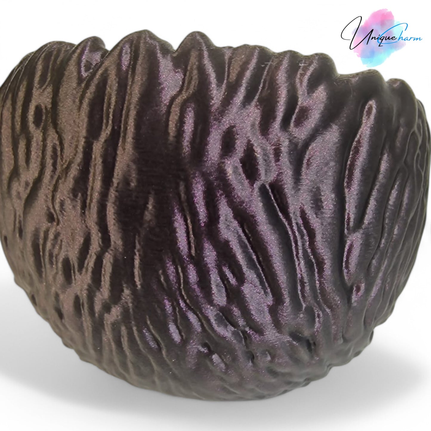 a beautifully designed walnut-shaped bowl resembling a quarter of a walnut shell, perfect as a key tray, candy dish, or nut bowl. features a rustic, nature-inspired design with a smooth finish, making it a stylish and functional home décor piece.