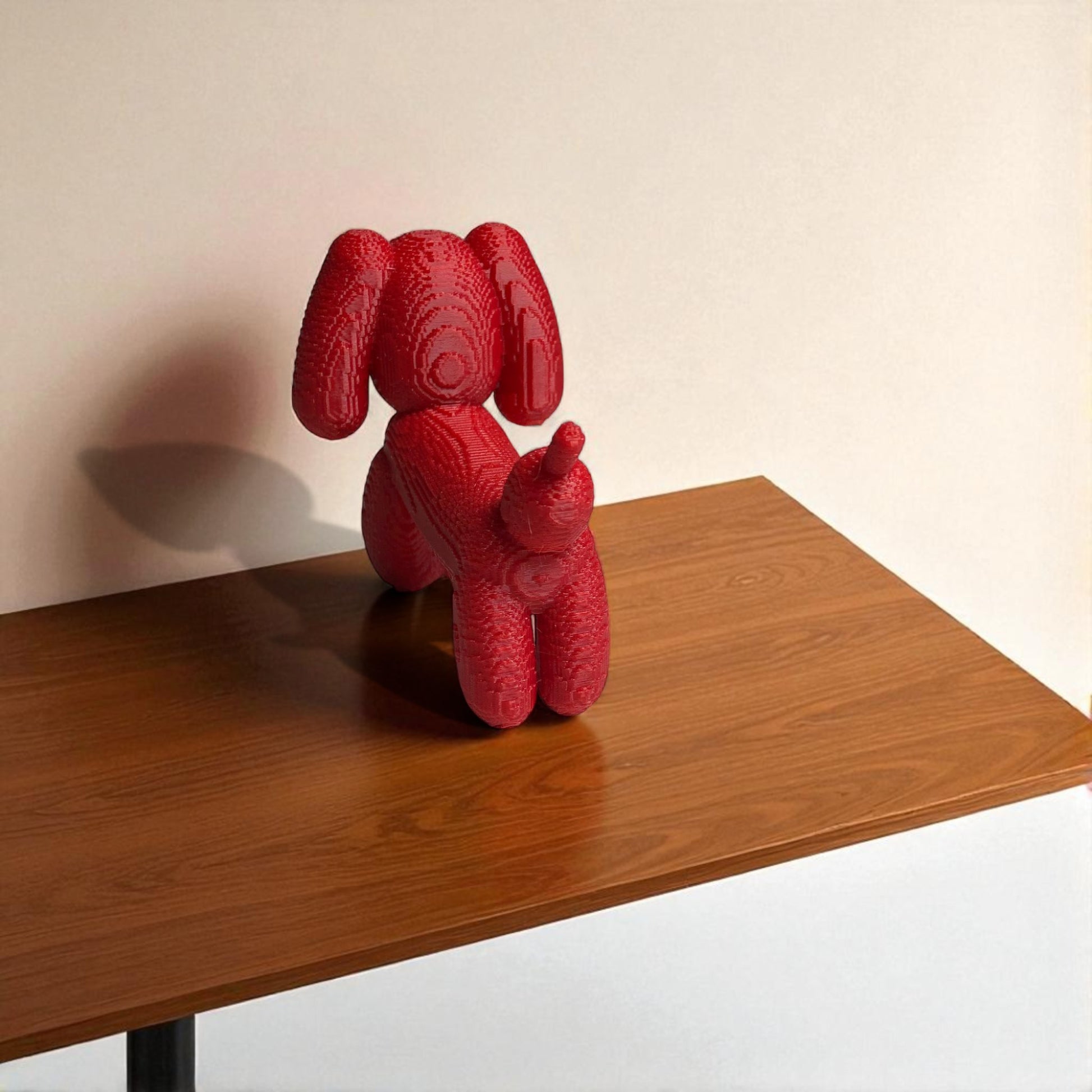 Pixel Dachshund Balloon Dog – A modern 3D-printed decorative piece inspired by a wiener dog, featuring a pixelated design for a unique and playful look. Available in two sizes, perfect for home or office decor.