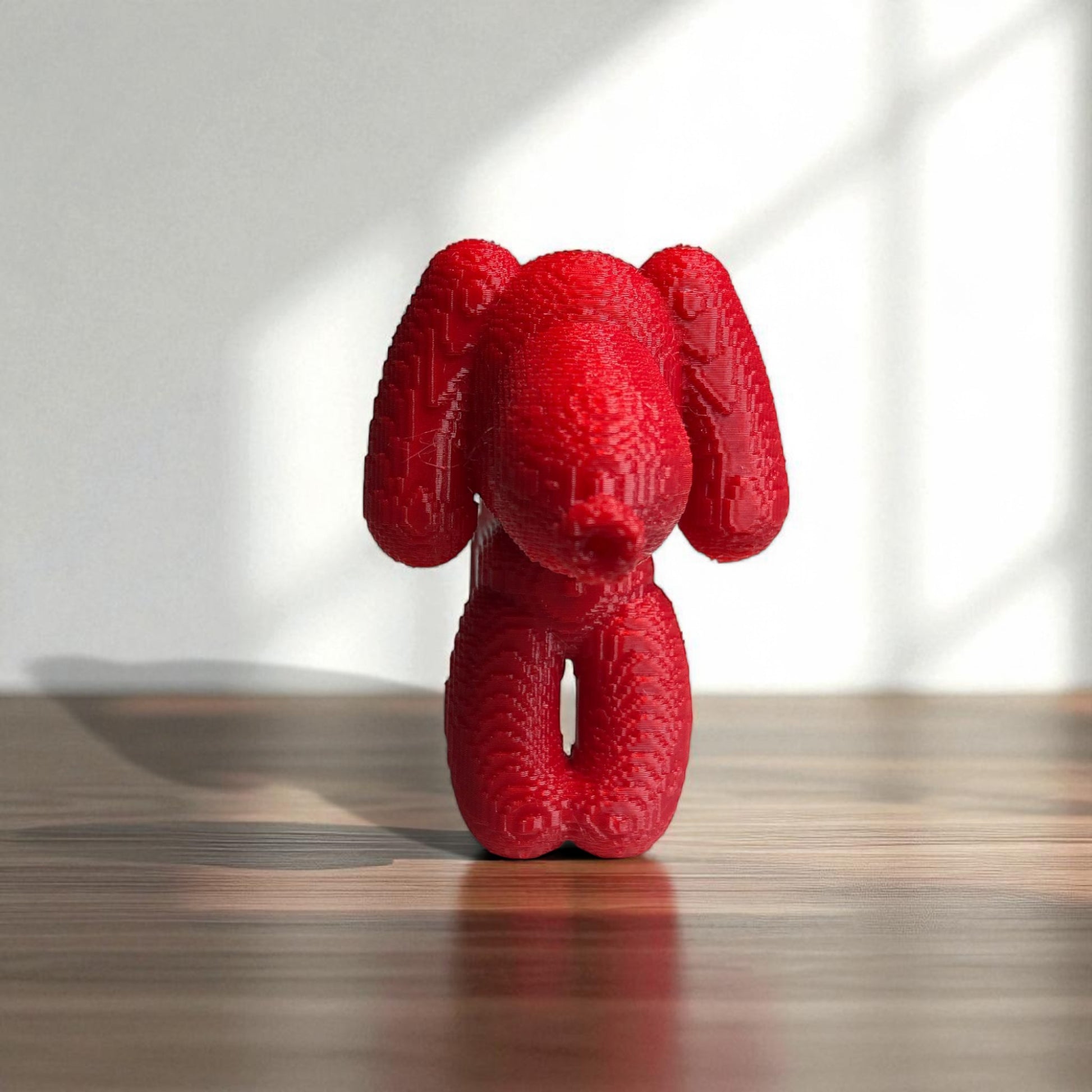 Pixel Dachshund Balloon Dog – A modern 3D-printed decorative piece inspired by a wiener dog, featuring a pixelated design for a unique and playful look. Available in two sizes, perfect for home or office decor.