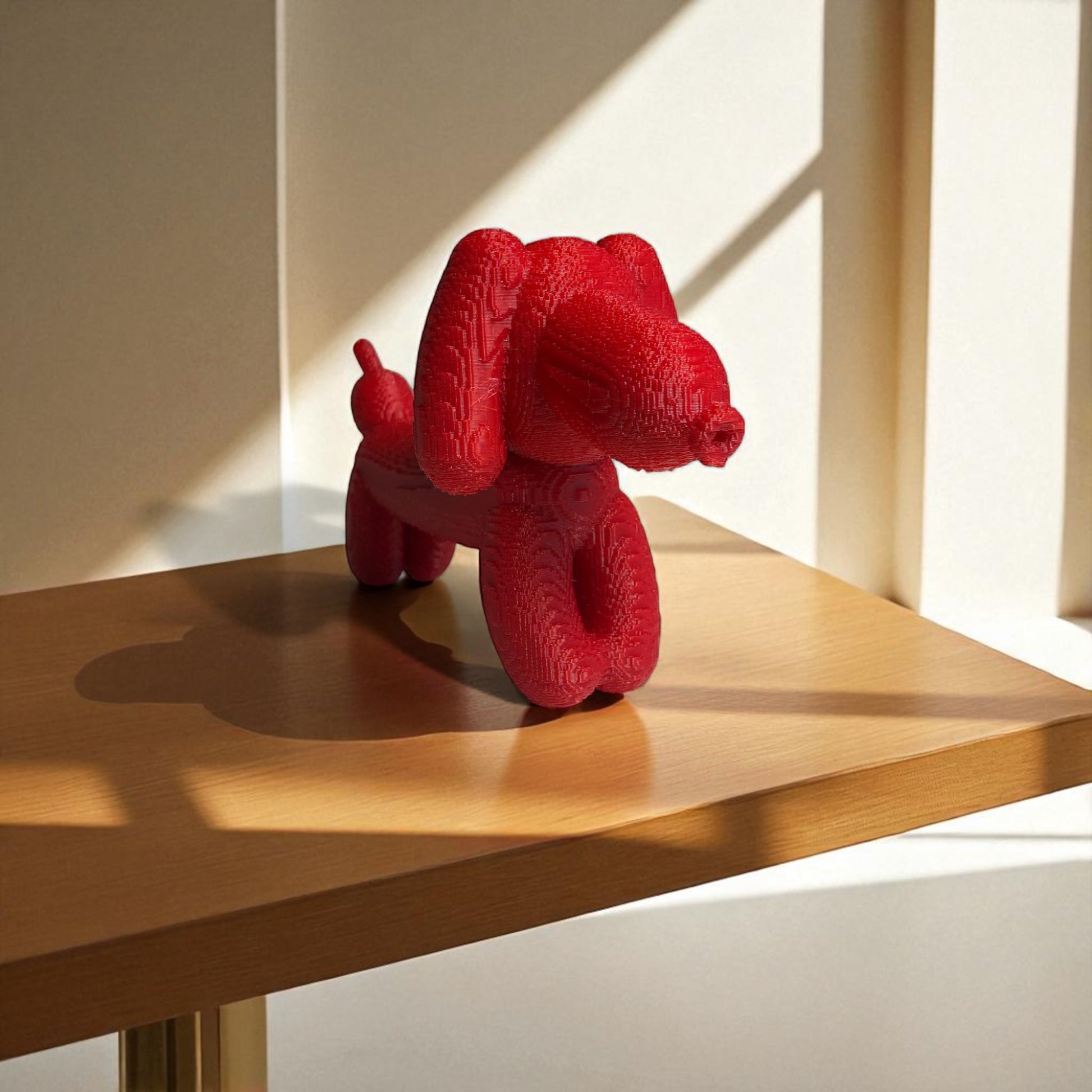 Pixel Dachshund Balloon Dog – A modern 3D-printed decorative piece inspired by a wiener dog, featuring a pixelated design for a unique and playful look. Available in two sizes, perfect for home or office decor.