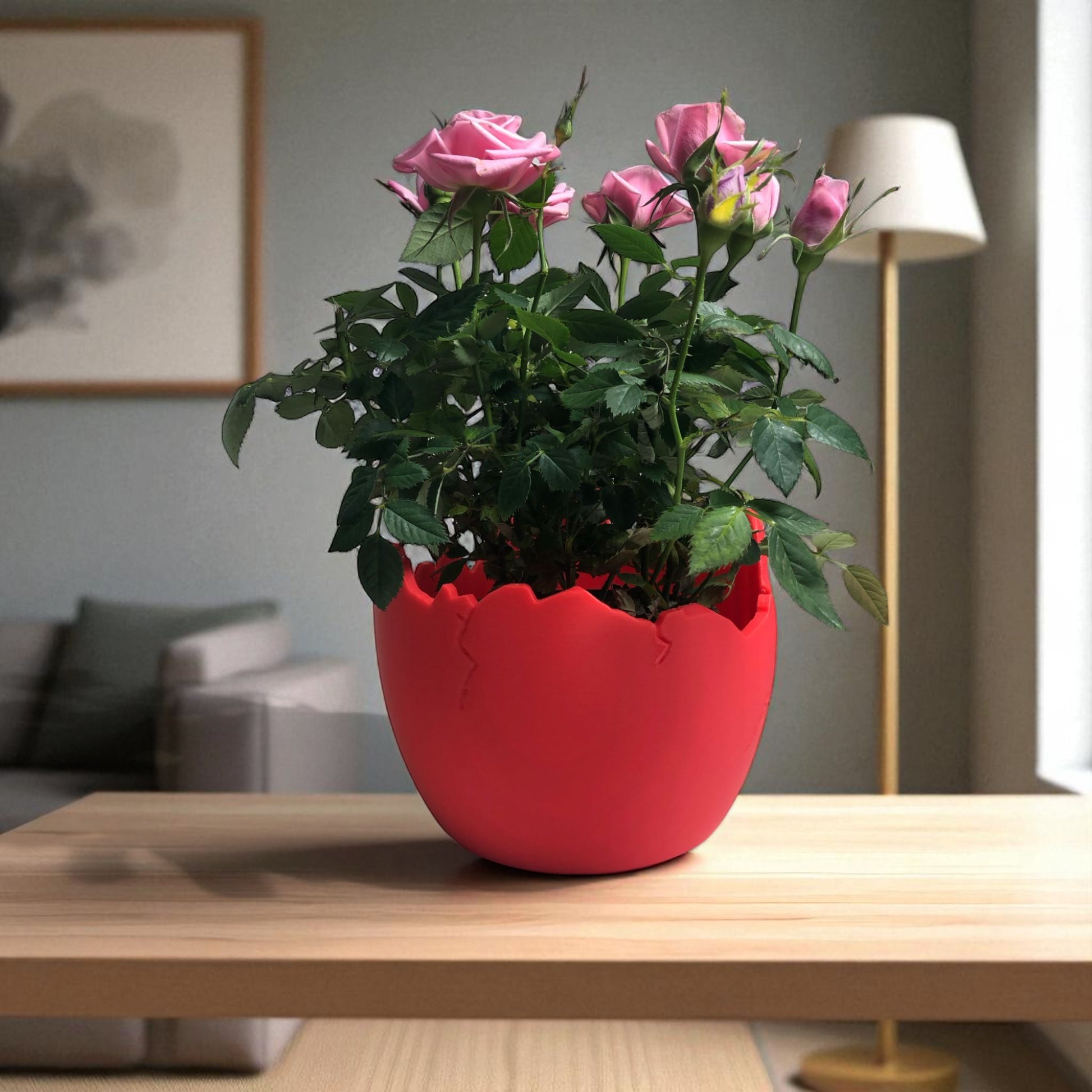 A modern cracked egg-shaped planter holding a small succulent, perfect for Easter decor and spring home styling. This unique plant pot is ideal for small to medium plants, adding a fresh and charming touch to any windowsill, desk, or shelf.