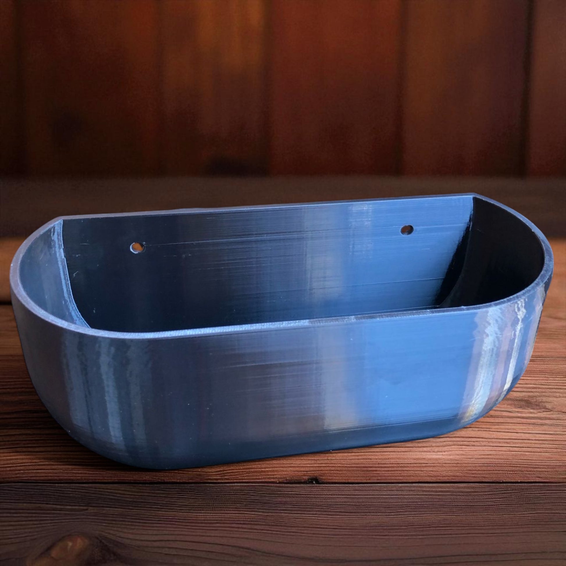 Modern rectangular wall planter with rounded corners, mounted on a wall and planted with fresh herbs like parsley, coriander, and basil. The large 3D printed planter is shown in use indoors, highlighting its sleek design and easy wall-mount installation with screws or tape