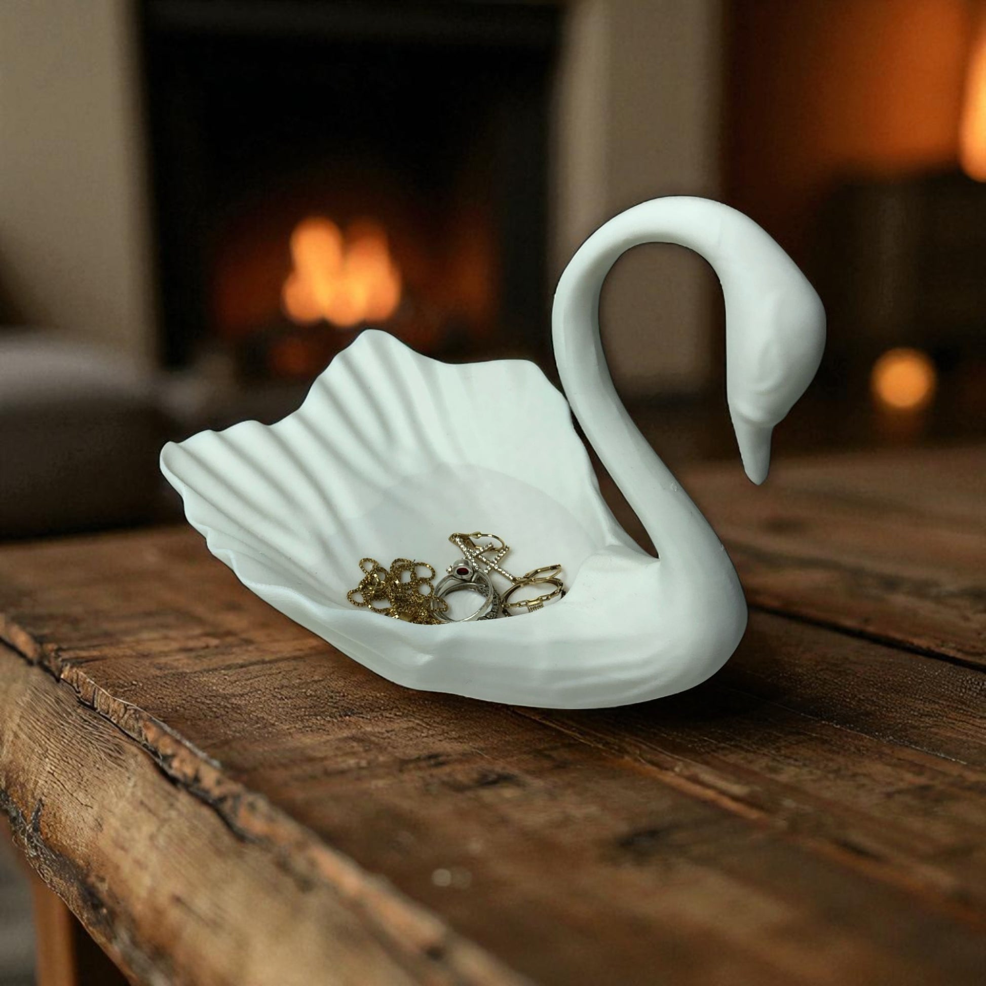 Elegant 3D printed Swan-shaped jewelry tray in a minimalist style, designed to hold rings, earrings, and small accessories. The swan's graceful neck curves upward, adding a decorative and functional touch to vanities and dressers.