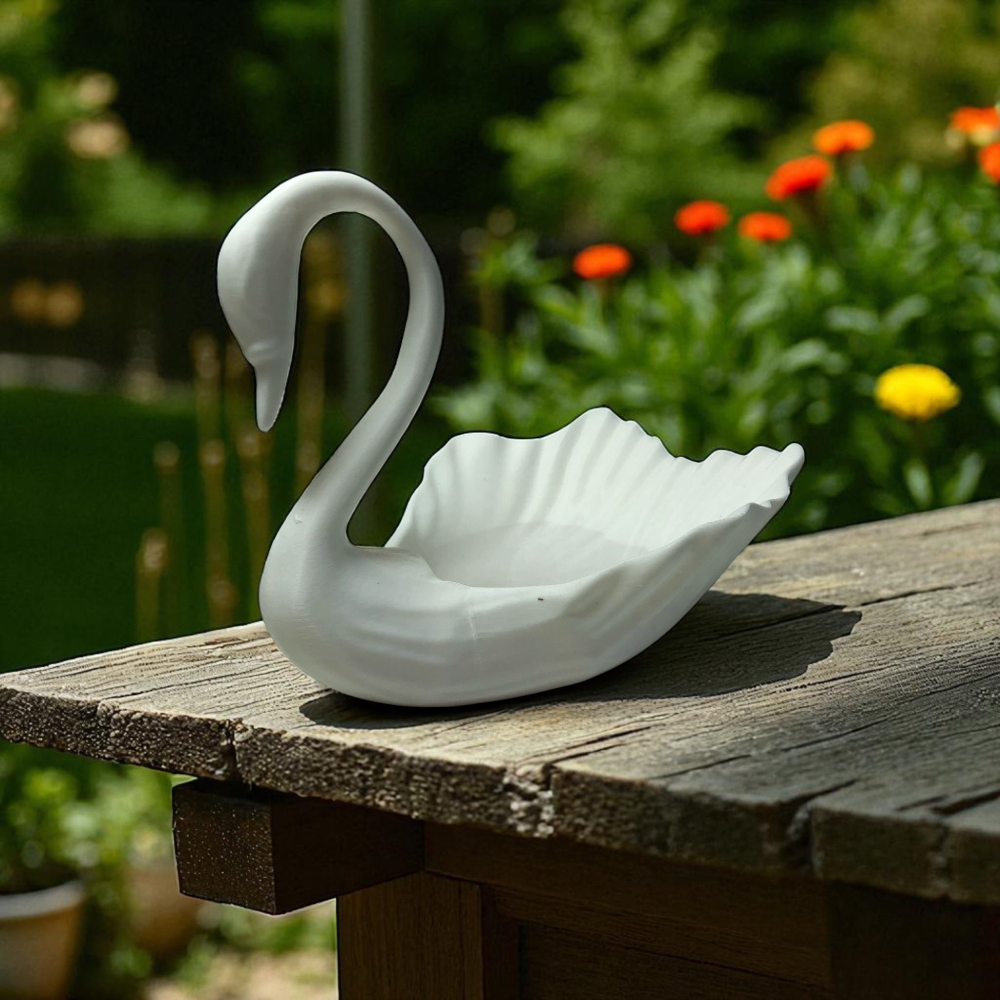 Elegant 3D printed Swan-shaped jewelry tray in a minimalist style, designed to hold rings, earrings, and small accessories. The swan's graceful neck curves upward, adding a decorative and functional touch to vanities and dressers.