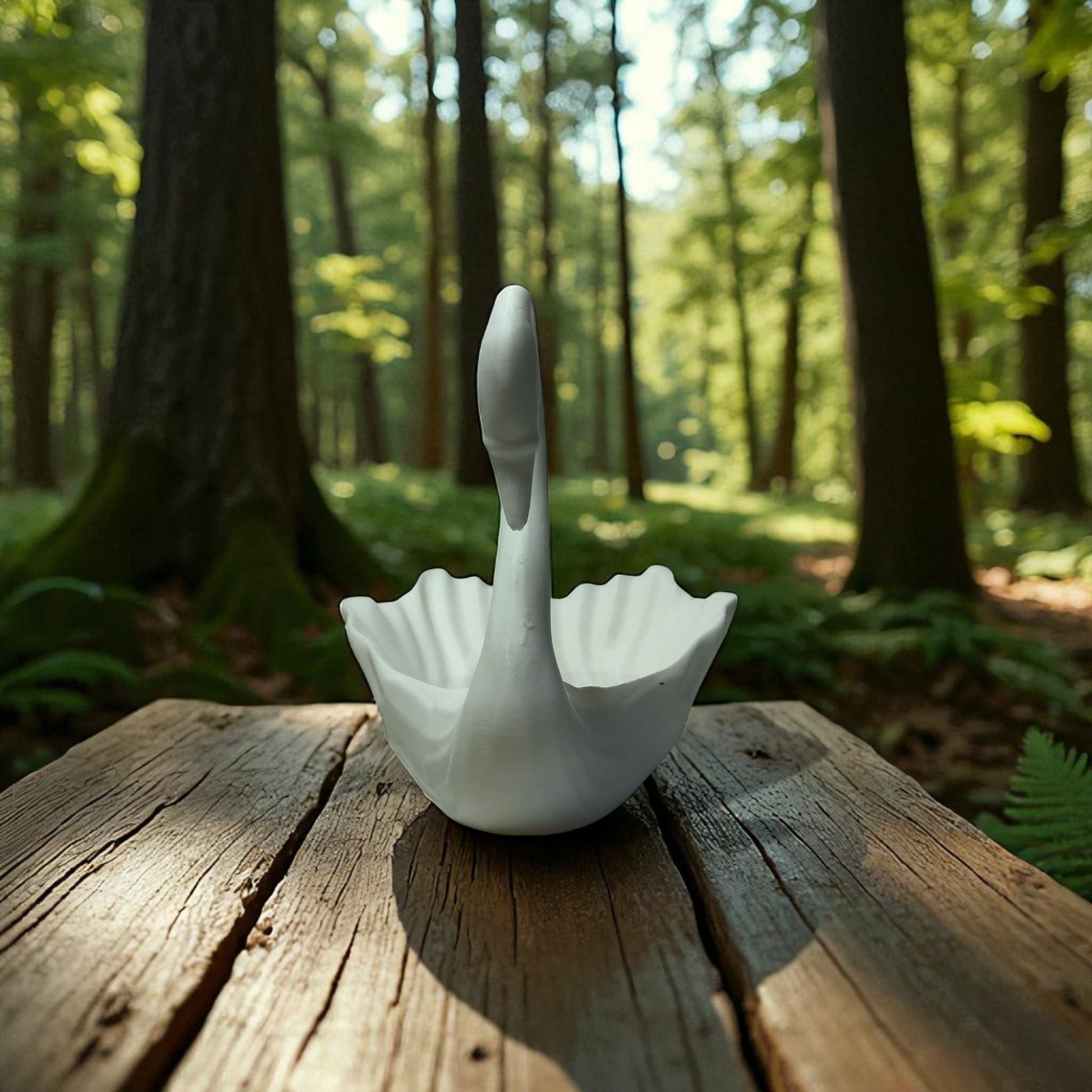 Elegant 3D printed Swan-shaped jewelry tray in a minimalist style, designed to hold rings, earrings, and small accessories. The swan's graceful neck curves upward, adding a decorative and functional touch to vanities and dressers.