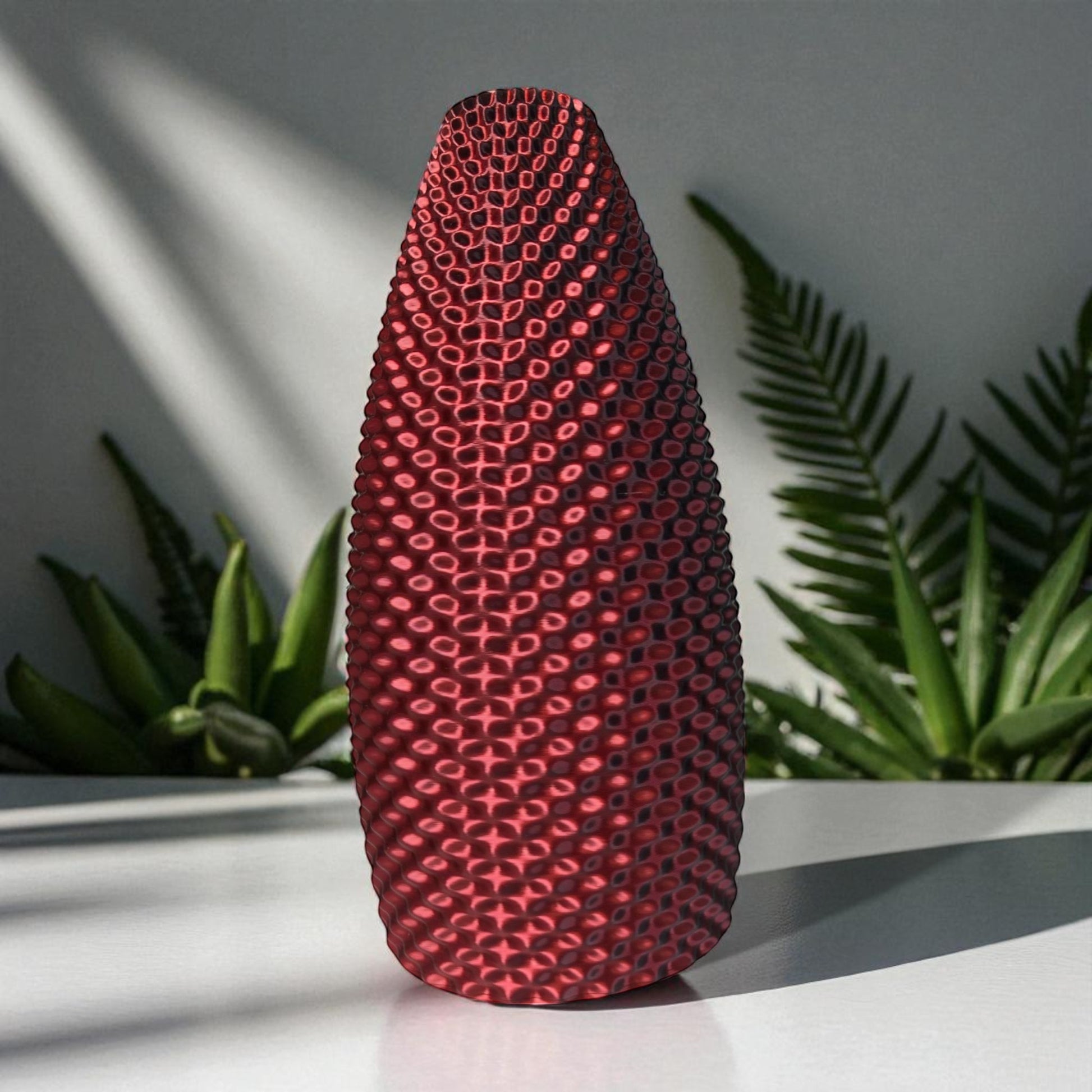 Limited edition color-shifting vase in red/black and purple/blue hues, 3D printed modern home decor piece that changes color with movement and light