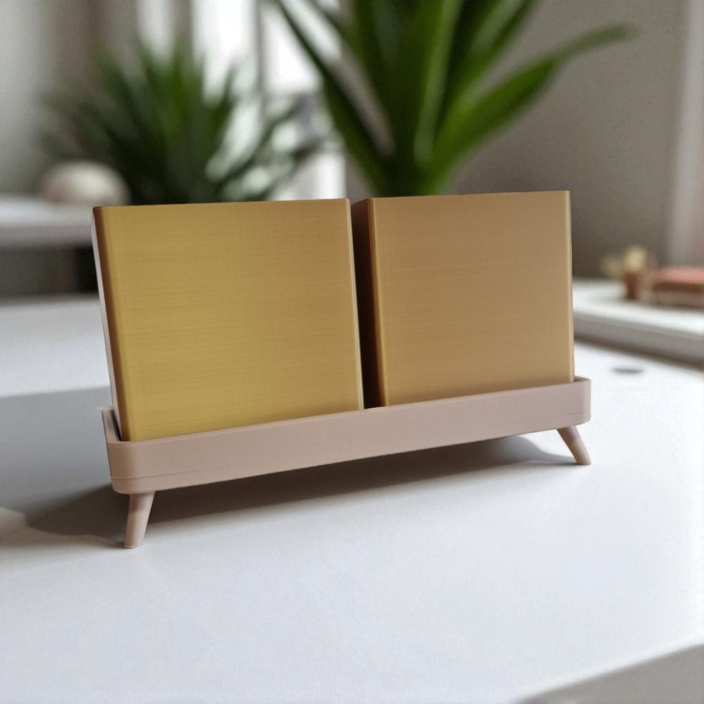 planter a versatile planter available in a single-piece design with a tray or a twin planter set with a shared tray, both featuring trays with raised feet for stability and style, perfect for growing herbs indoors or outdoors.