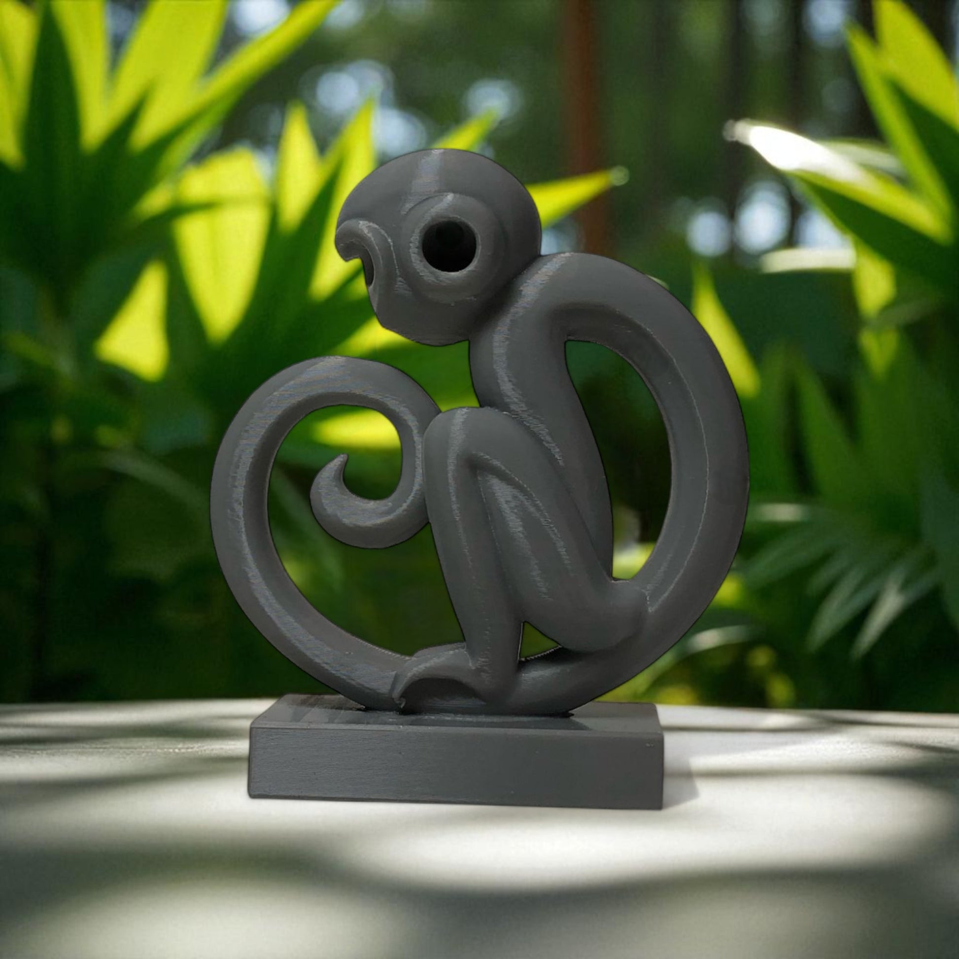 Modern artistic monkey statue with a unique abstract design, 3D printed in eco-friendly material, ideal for home decor or as a gift for animal and art lovers.