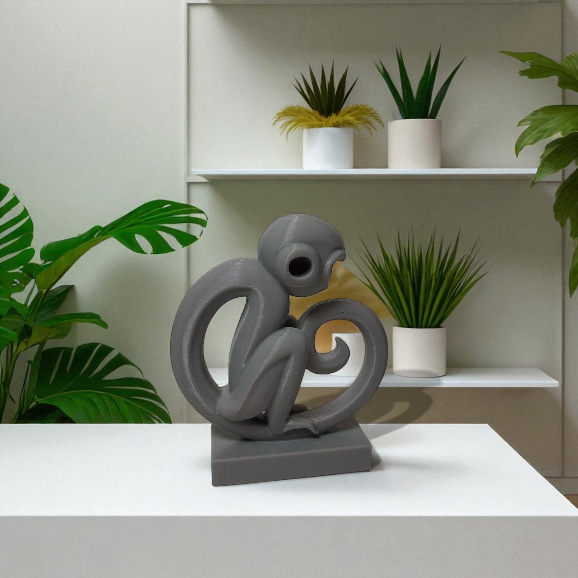 Modern artistic monkey statue with a unique abstract design, 3D printed in eco-friendly material, ideal for home decor or as a gift for animal and art lovers.