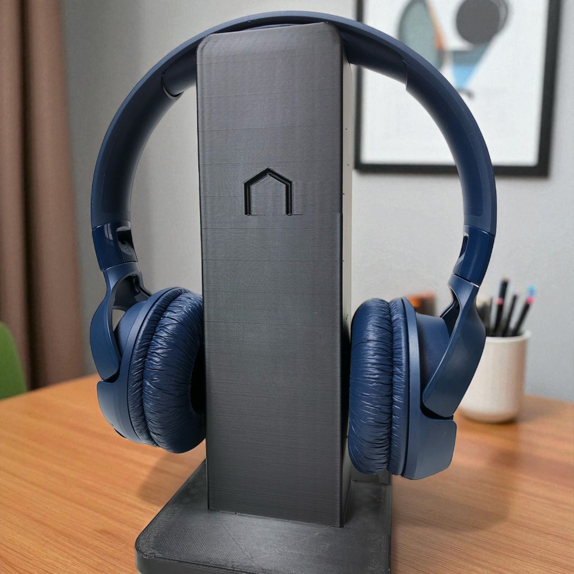 Sleek rectangular headphone stand with a modern minimalist design, featuring a small notch for hanging headphones—ideal for desk organization, gaming setups, or home offices.