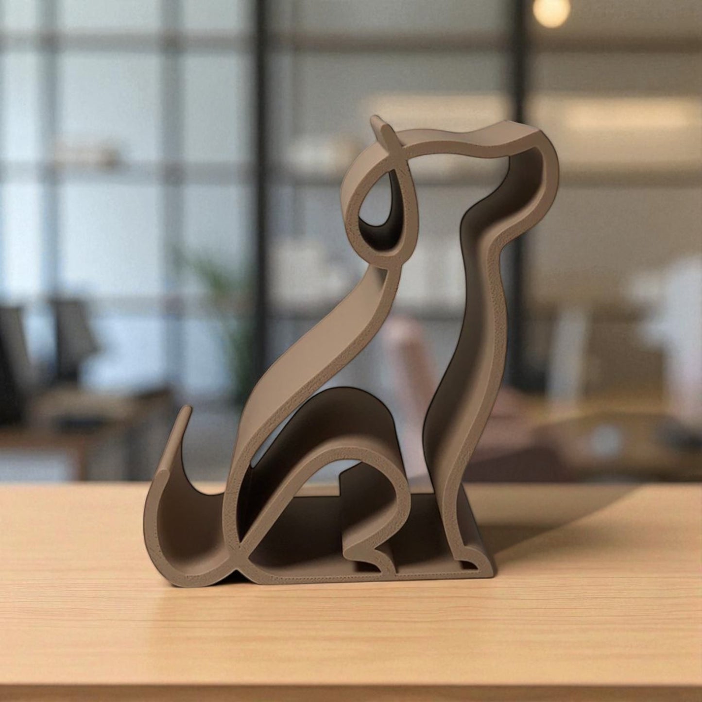 3d printed pink dog-shaped phone holder for desk, used to support a smartphone, tablet, or kindle, ideal for pet lovers and home office decor