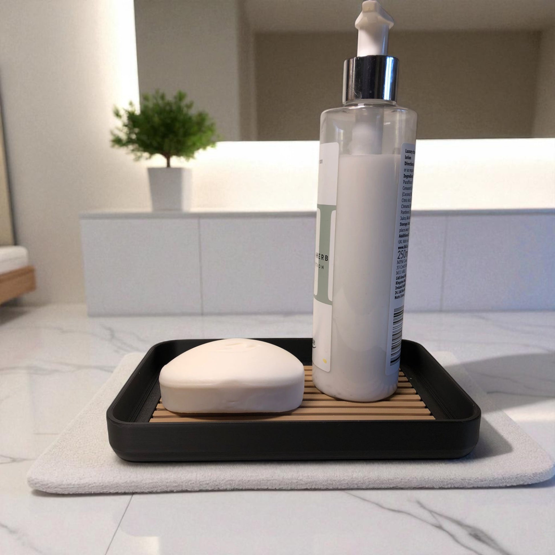 Modern soap tray with raised drainage support, shown holding a soap bar and pump bottle, perfect for bathroom organization and keeping soap dry

