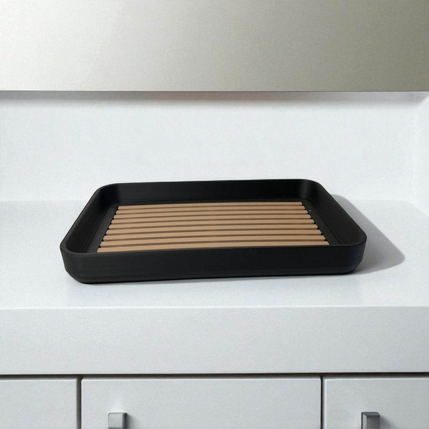 modern soap tray with raised drainage support, shown holding a soap bar and pump bottle, perfect for bathroom organization and keeping soap dry

