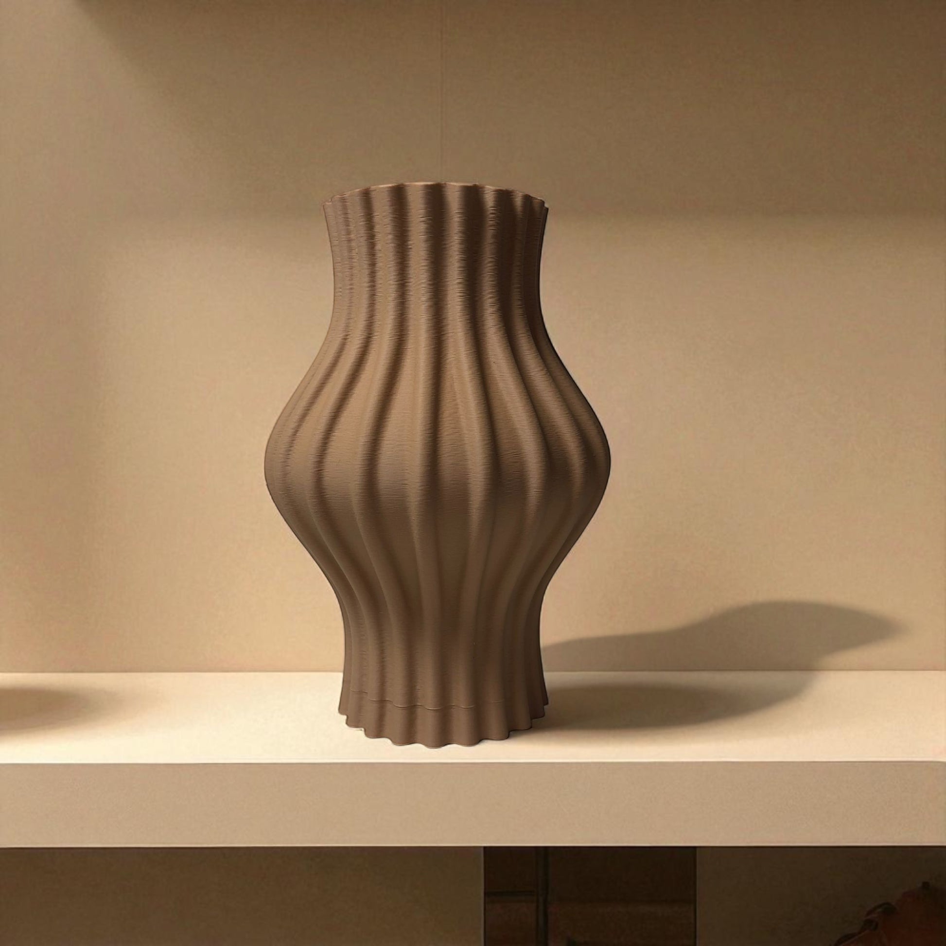Modern 3D printed sculptural vase with wavy vertical grooves, shown in matte beige color on a white background – minimalist Nordic home decor centerpiece.