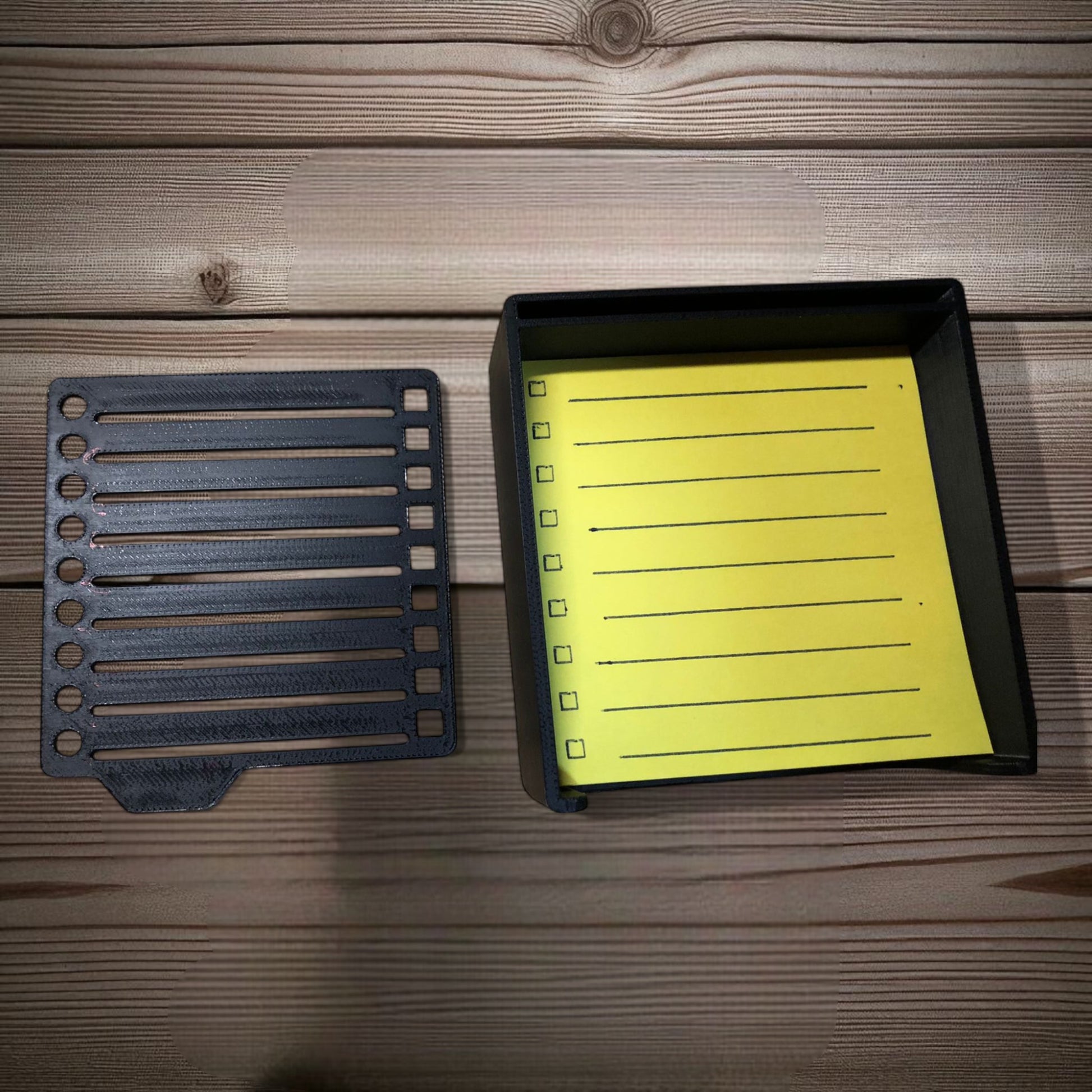 Sticky note holder with colorful sticky notes and three reusable stencils, designed for organizing notes and boosting productivity at a work desk