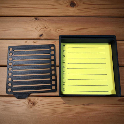 Sticky note holder with colorful sticky notes and three reusable stencils, designed for organizing notes and boosting productivity at a work desk