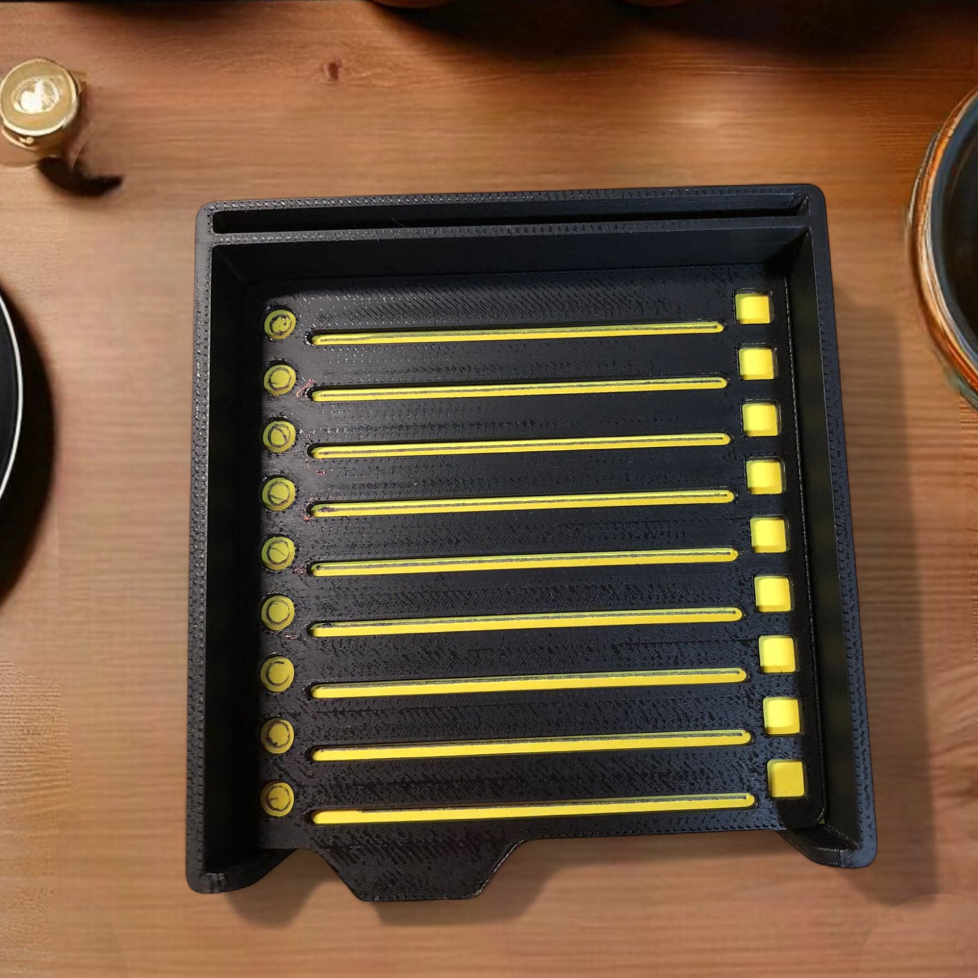 Sticky note holder with colorful sticky notes and three reusable stencils, designed for organizing notes and boosting productivity at a work desk