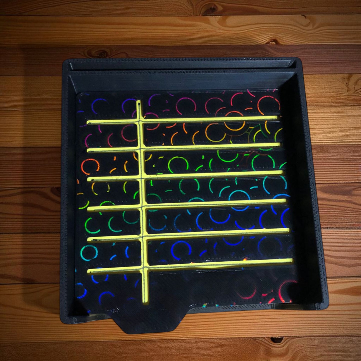 sticky note holder with colorful sticky notes and three reusable stencils, designed for organizing notes and boosting productivity at a work desk