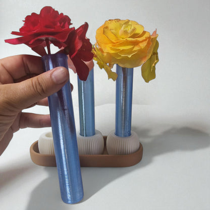  modern 3-vase set, designed for anyone who loves fresh flowers and clean design. This eye-catching piece includes three sleek test tube-style vases securely held in a beautifully minimal tray – perfect for desks, coffee tables, windowsills, or shelves.