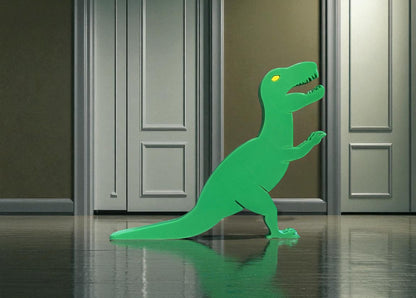 A playful Dino Door Stopper designed in the shape of a dinosaur, adding a fun and functional touch to any room. This unique door stopper keeps doors in place with a charming prehistoric flair