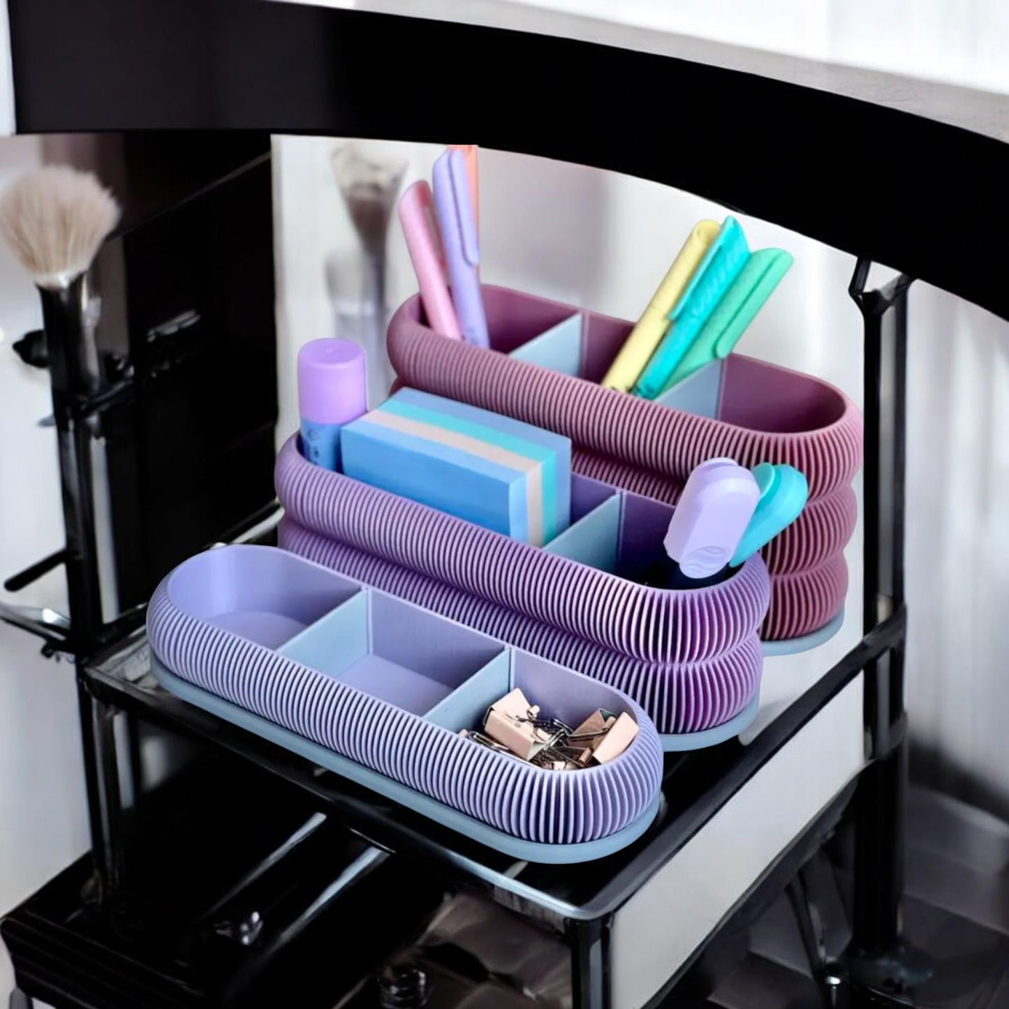 an elegant charmnest organizer, designed for vanity or desk storage, featuring multiple compartments in a stylish, compact shape. perfect for organizing makeup, brushes, pens, and small essentials, this organizer brings a touch of sophistication