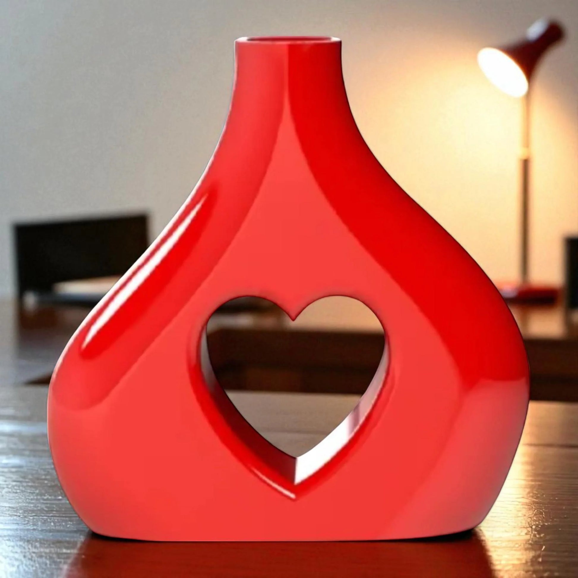 Asymmetric Vase A uniquely shaped vase featuring an asymmetric design with a heart-shaped cut out in the centre, perfect for adding a touch of charm to any space.