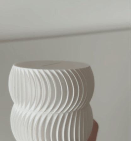  luxury coin bank designed to turn saving into a sophisticated experience. Available in two different sizes, this stylish coin bank seamlessly blends form and function, making it the perfect addition to any home or office. 