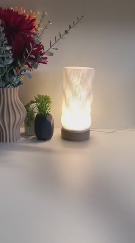 Bedside lamp with USB cable, white shade and coloured base, perfect for living room, bedroom, or nursery.
