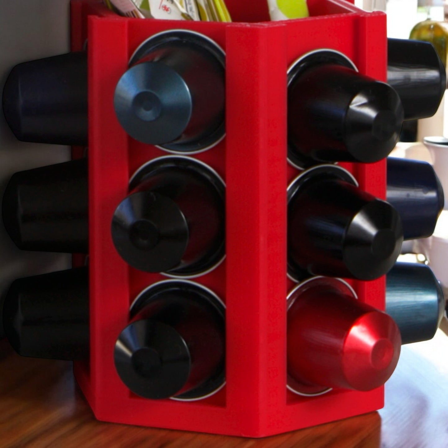 coffee capsule holder with a sleek design, holds up to 18 coffee capsules, featuring a central compartment for sugar bags or accessories, perfect for keeping your coffee station organized and tidy