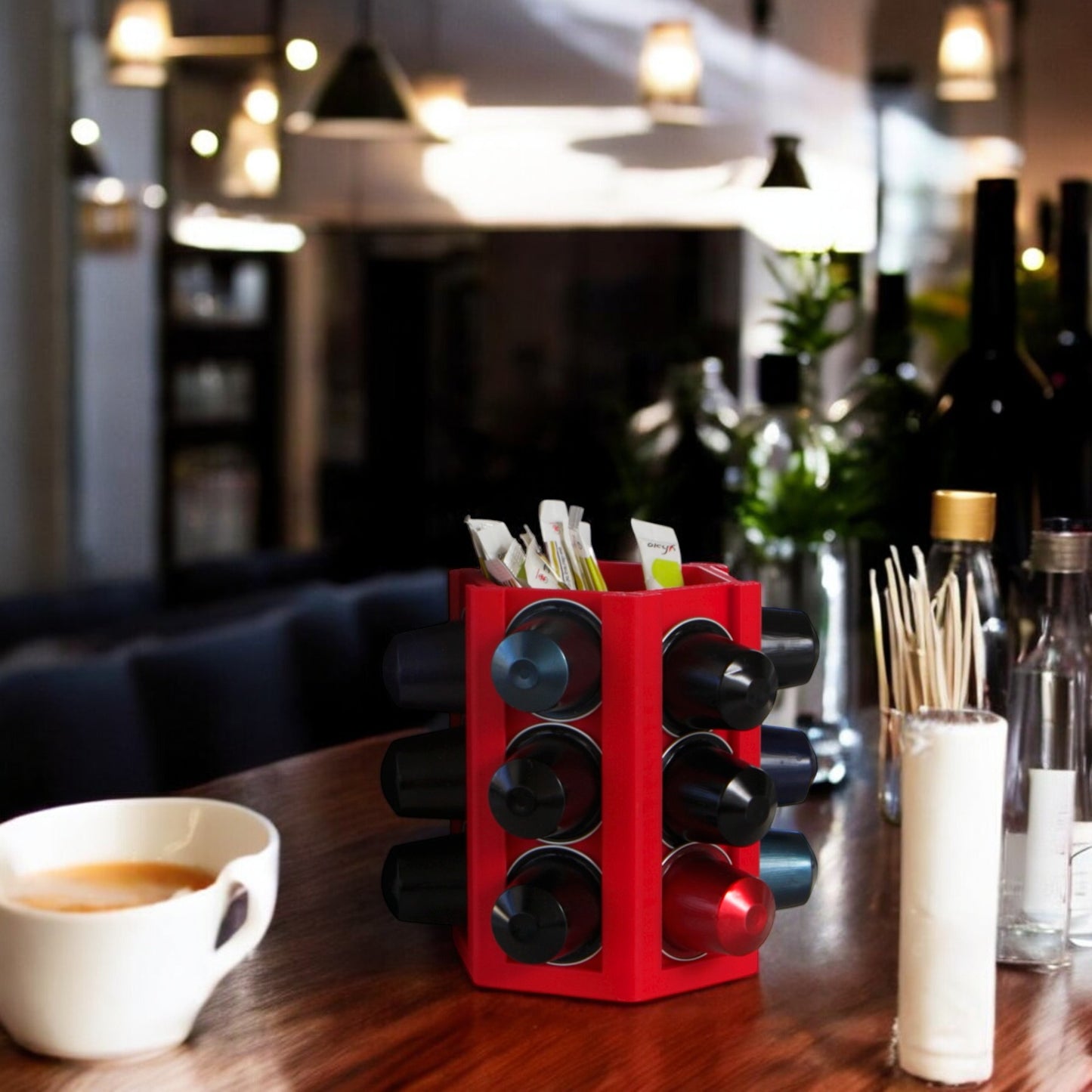 coffee capsule holder with a sleek design, holds up to 18 coffee capsules, featuring a central compartment for sugar bags or accessories, perfect for keeping your coffee station organized and tidy