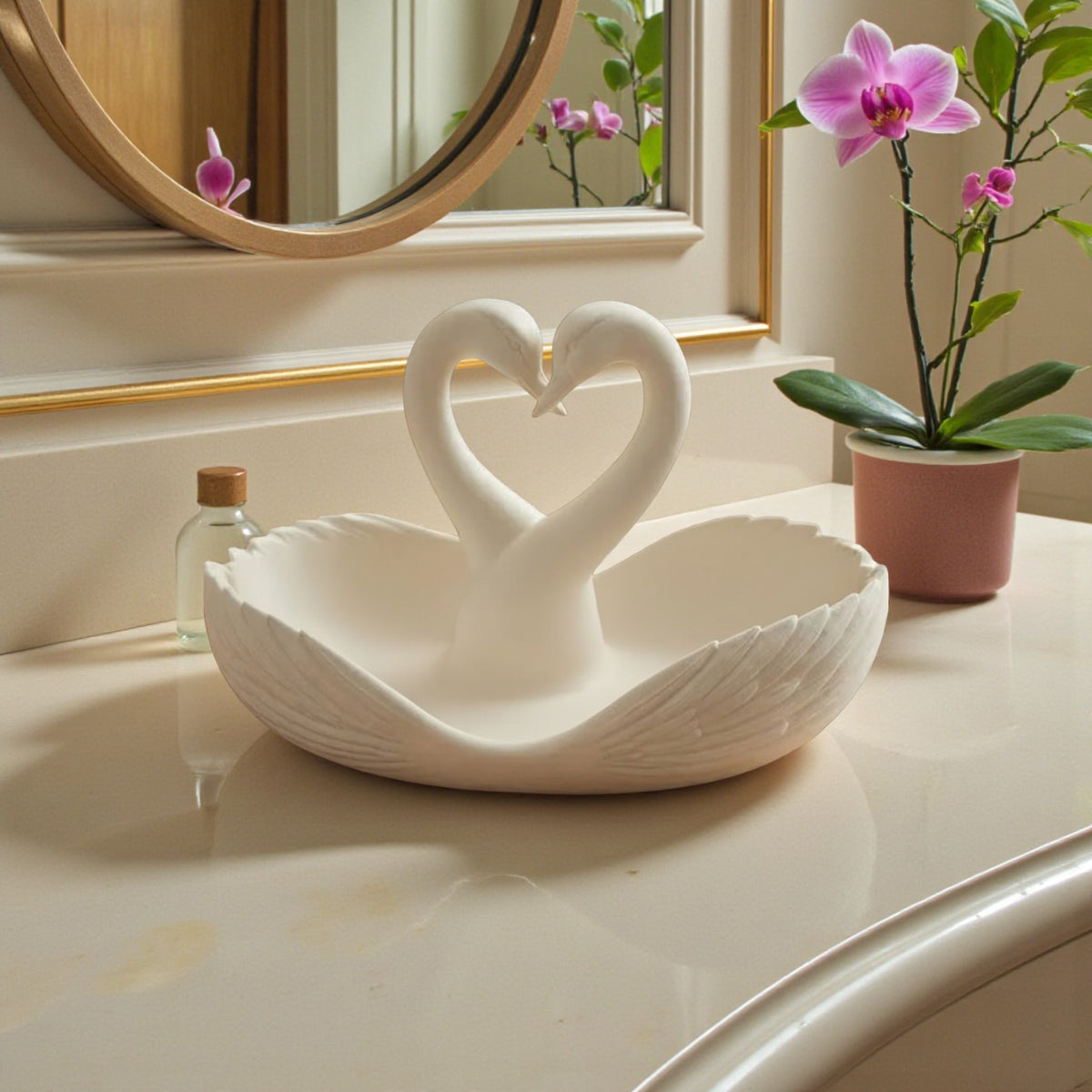 elegant swan trinket tray holding keys and sunglasses on a wooden table
 decorative swan jewelry dish used as an entryway catchall tray
 sculptural swan bowl with matte finish for vanity or bedside decor
 modern swan tray for holding rings, jewelry, and everyday essentials
minimalist swan decor tray styled in a calm, neutral interior