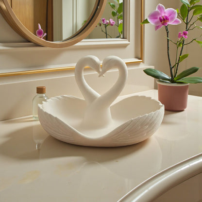 Elegant swan trinket tray holding keys and sunglasses on a wooden table
 Decorative swan jewelry dish used as an entryway catchall tray
 Sculptural swan bowl with matte finish for vanity or bedside decor
 Modern swan tray for holding rings, jewelry, and everyday essentials
Minimalist swan decor tray styled in a calm, neutral interior