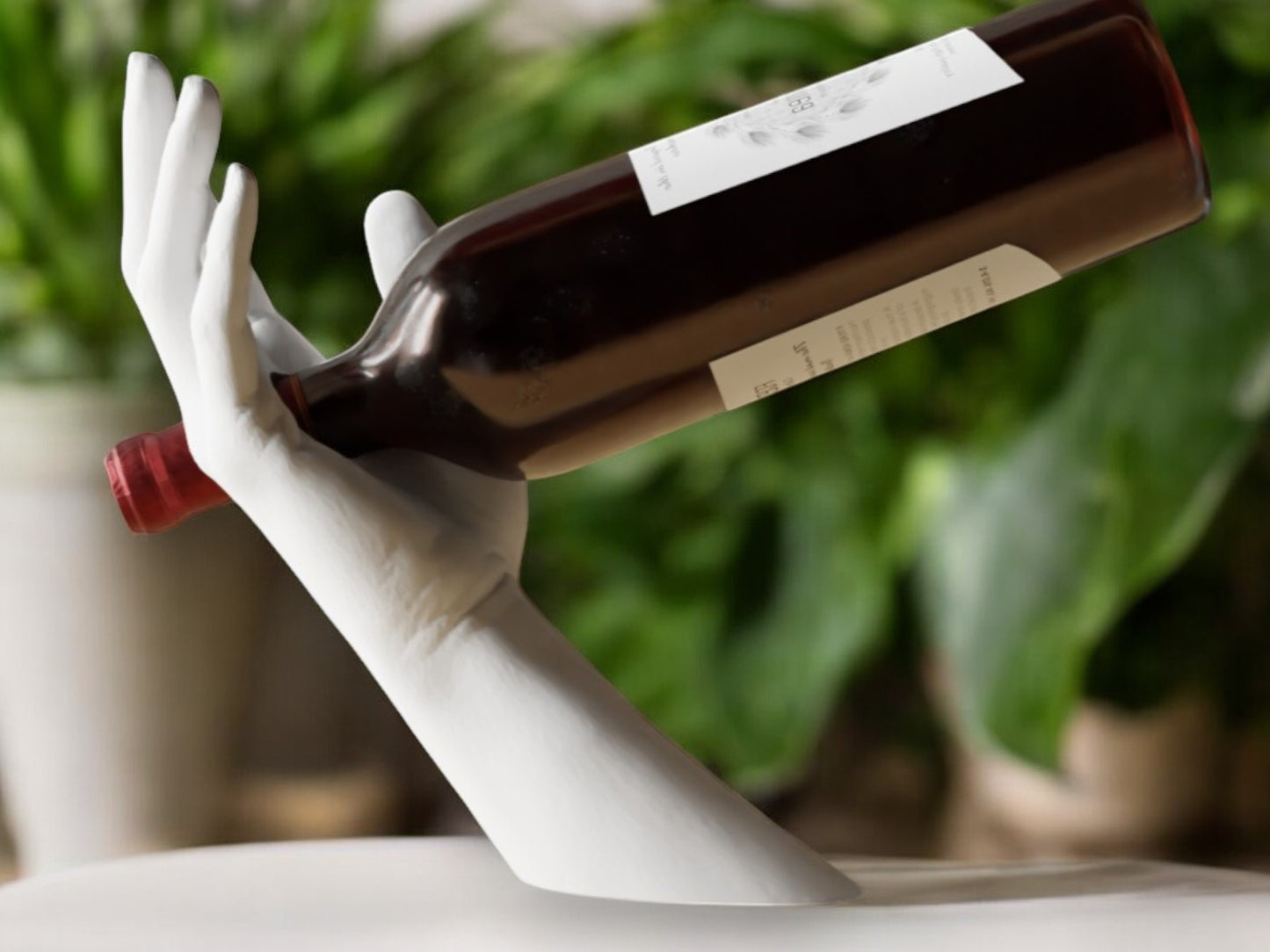 elegant hand-shaped wine holder with a unique arm design, perfect for stylishly displaying a wine bottle on countertops, dining tables, or home bars.