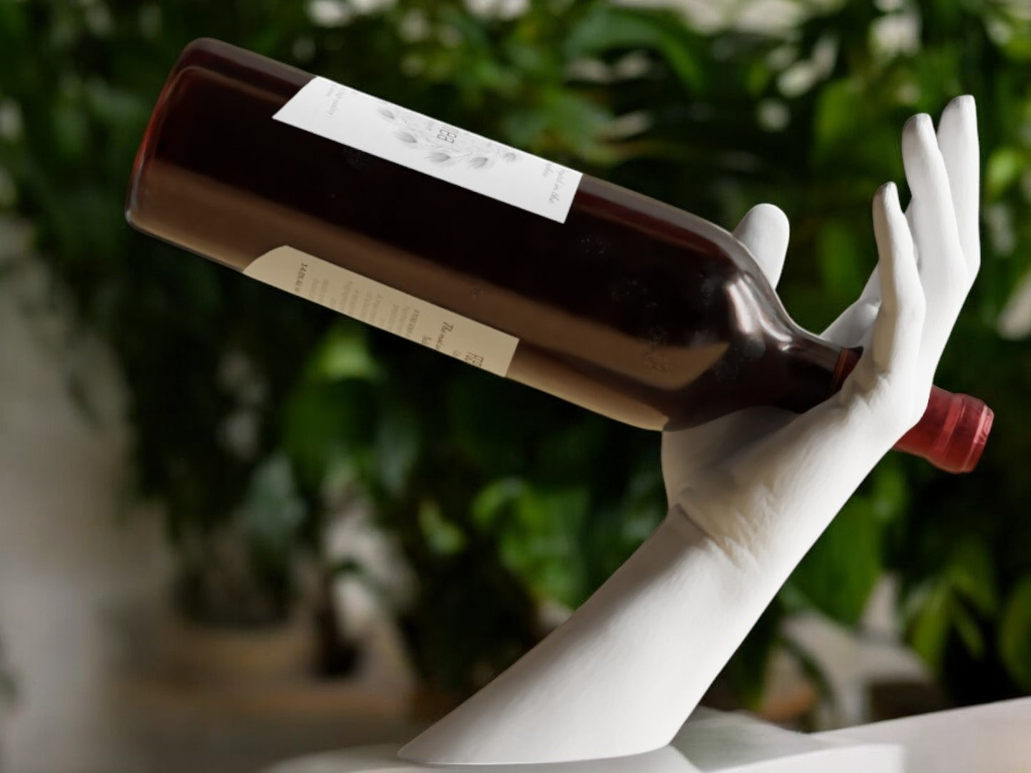 elegant hand-shaped wine holder with a unique arm design, perfect for stylishly displaying a wine bottle on countertops, dining tables, or home bars.