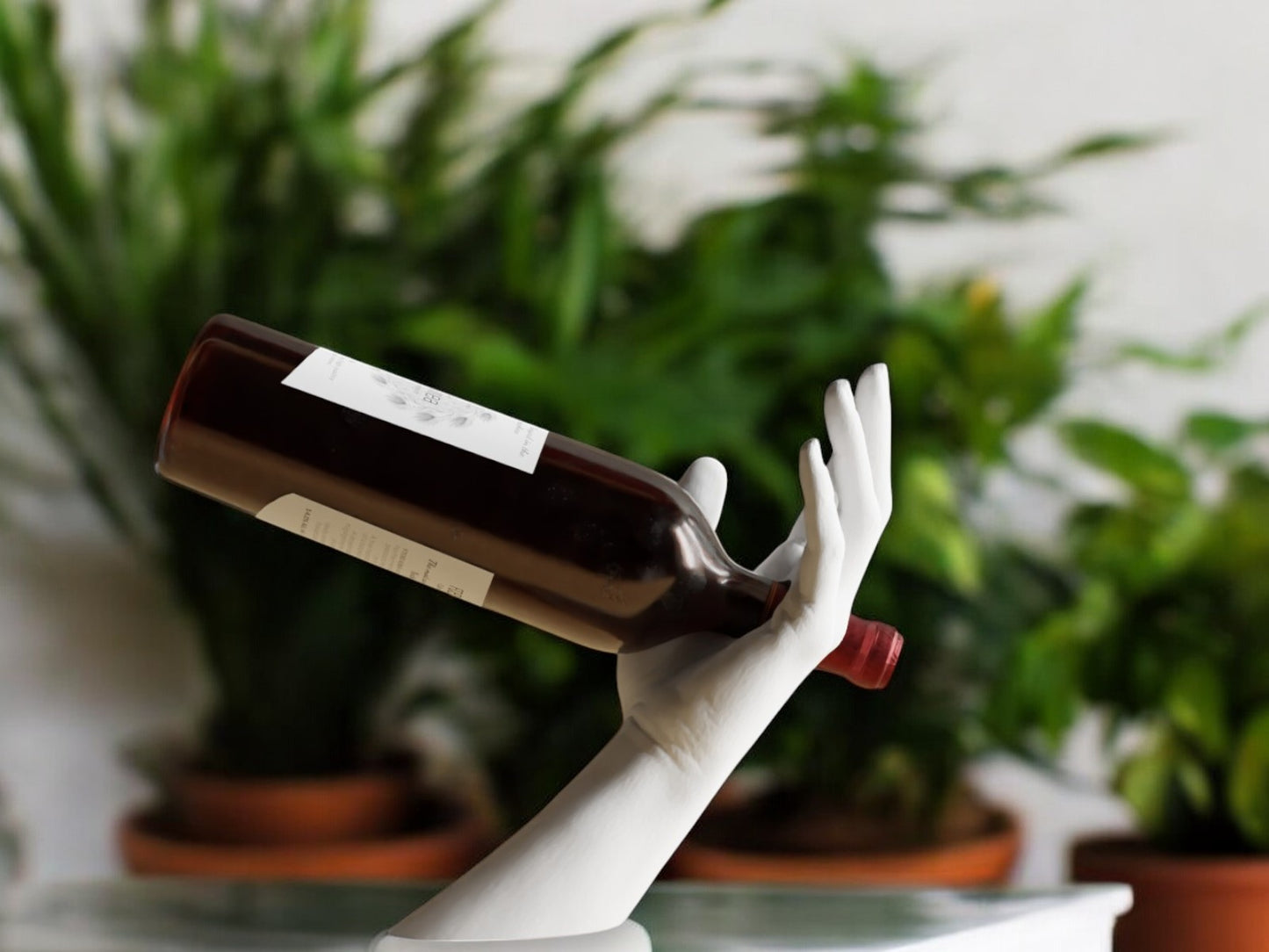 elegant hand-shaped wine holder with a unique arm design, perfect for stylishly displaying a wine bottle on countertops, dining tables, or home bars.