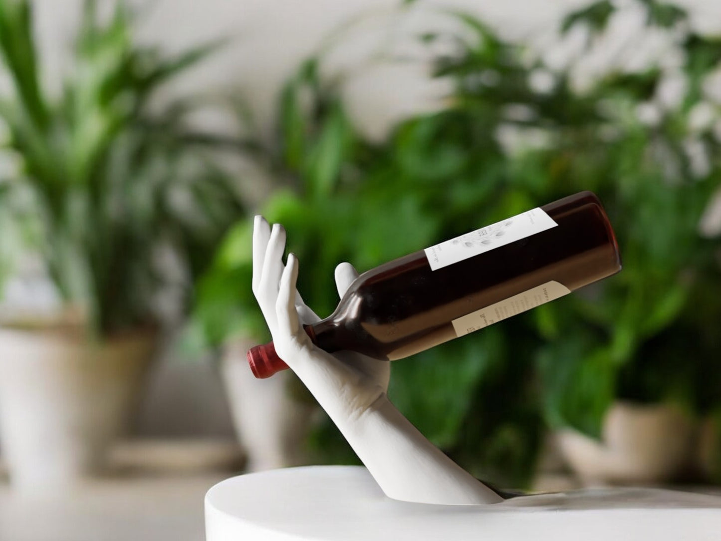 elegant hand-shaped wine holder with a unique arm design, perfect for stylishly displaying a wine bottle on countertops, dining tables, or home bars.